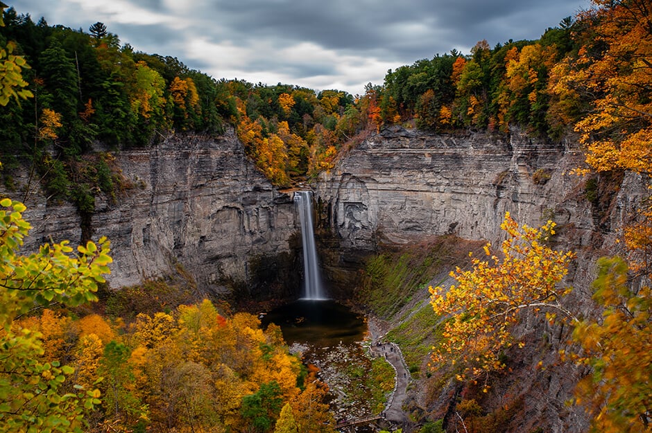 Romantic fall colours surround a waterfall in New Paltz, Finger Lakes, NY
