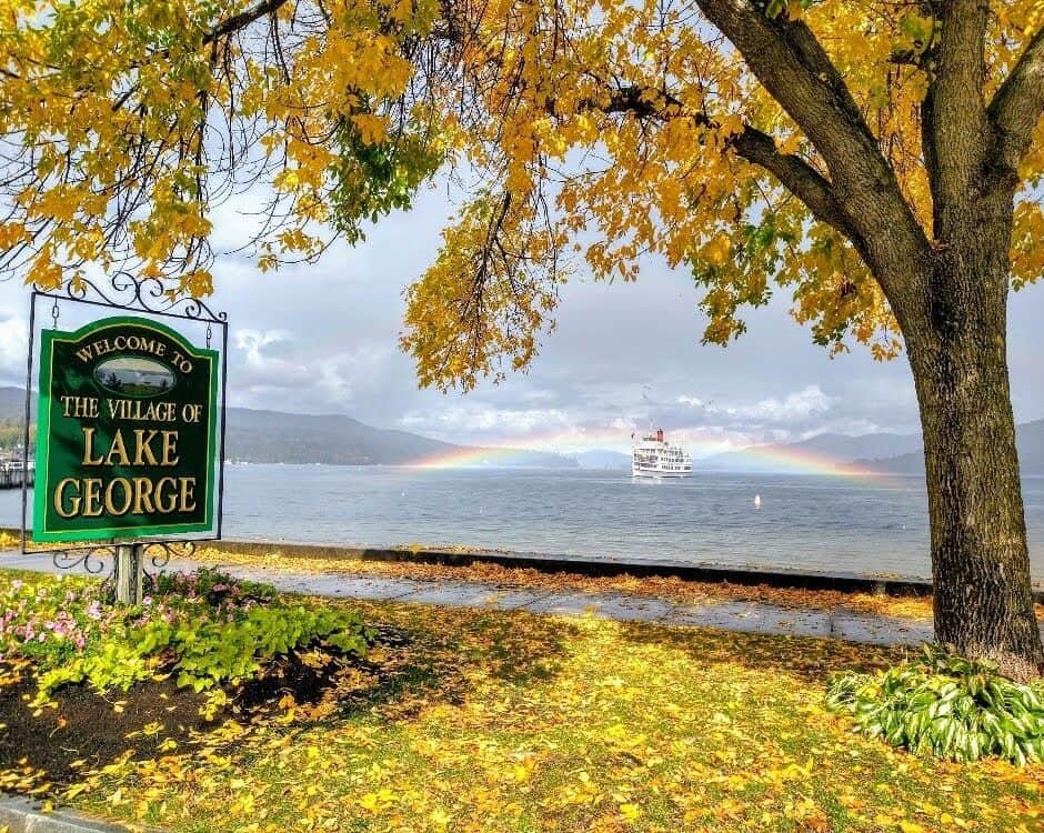Lake George and a tree covered in golden leaves in the Adirondacks in upstate NY