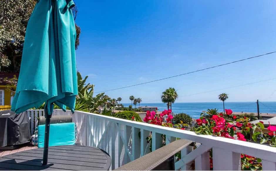 Balcony with view of the ocean and palm trees