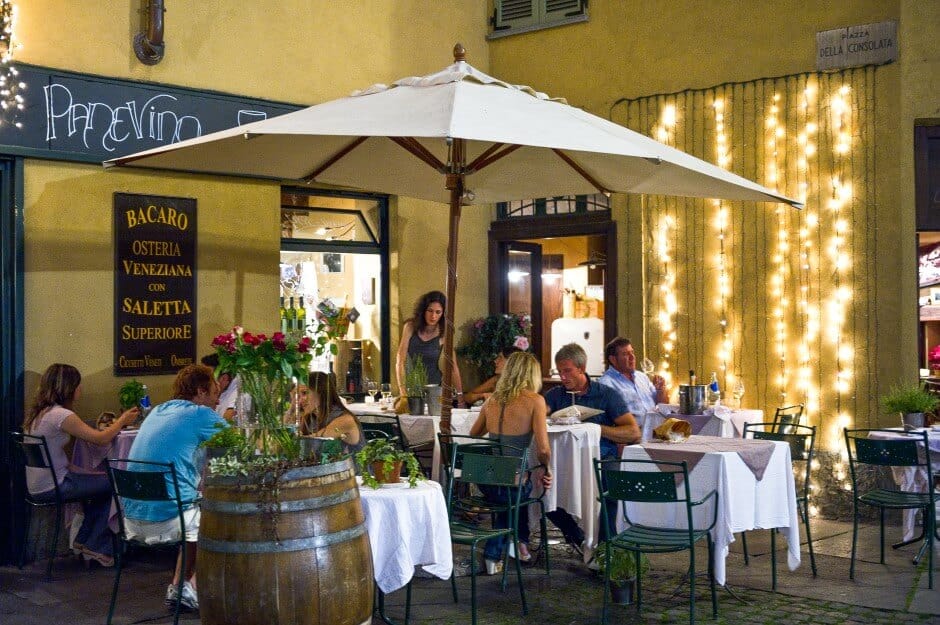 People dining outside an Italian restaurant, Turin