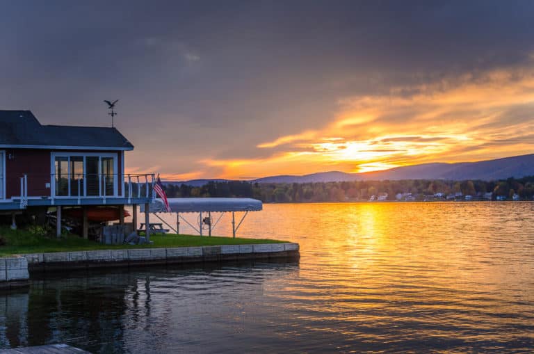 Cabin and dock at a lake at sunset in the Berkshies